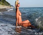 This hot bitch with big tits loves having the waves caress her pussy in front of everyone on the beach.Slow motion from nudist splashes in dark waves 3 750x1024