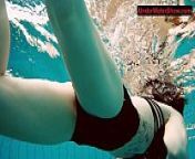 Tattooed b. swirls underwater from sport nudist gym
