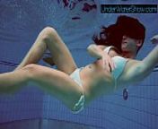 Sexy cute beauty Alla swims in the swimming pool from young russian nudist