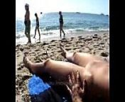 Woman walks naked around beach from naked woman walking