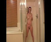 Meghan masturbates in the shower from redhead slut