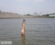 Girl bathes naked in the river and masturbates on the shore from naked beach voyeur