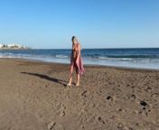 Girl Walking on the beach and flashing body on public from men piss